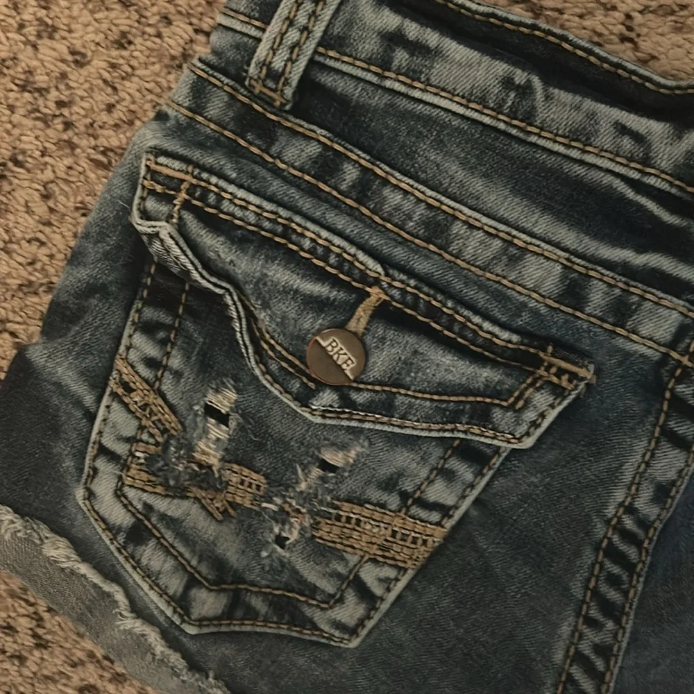 2 pair BKE denim shorts. Previously worn. Size 25. Mild distressed.orig buttons - Picture 4 of 6